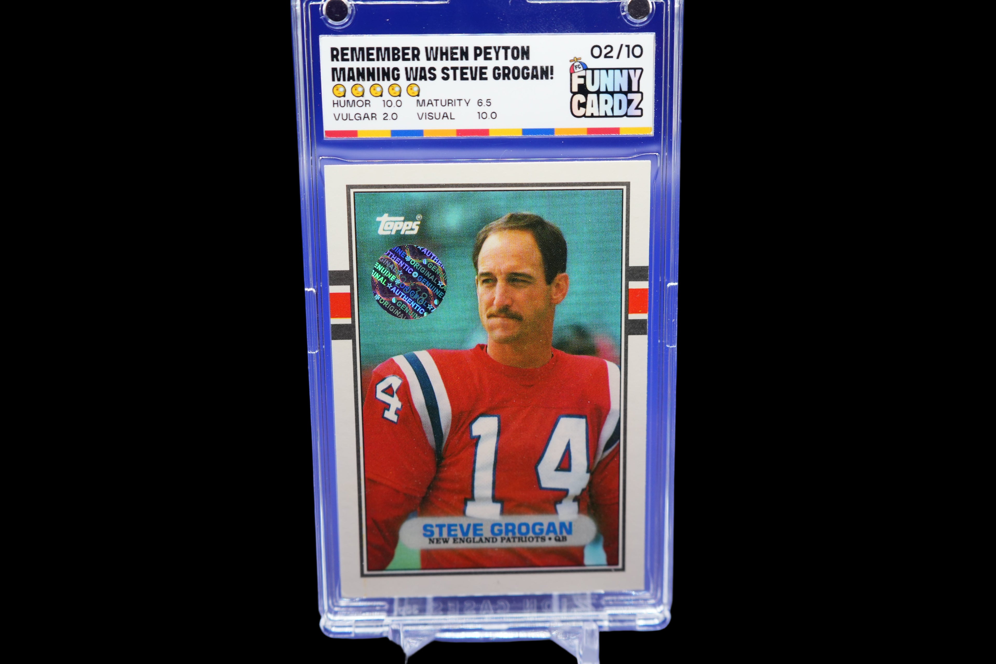 Trading card of Steve Grogan in a protective case with a blue background