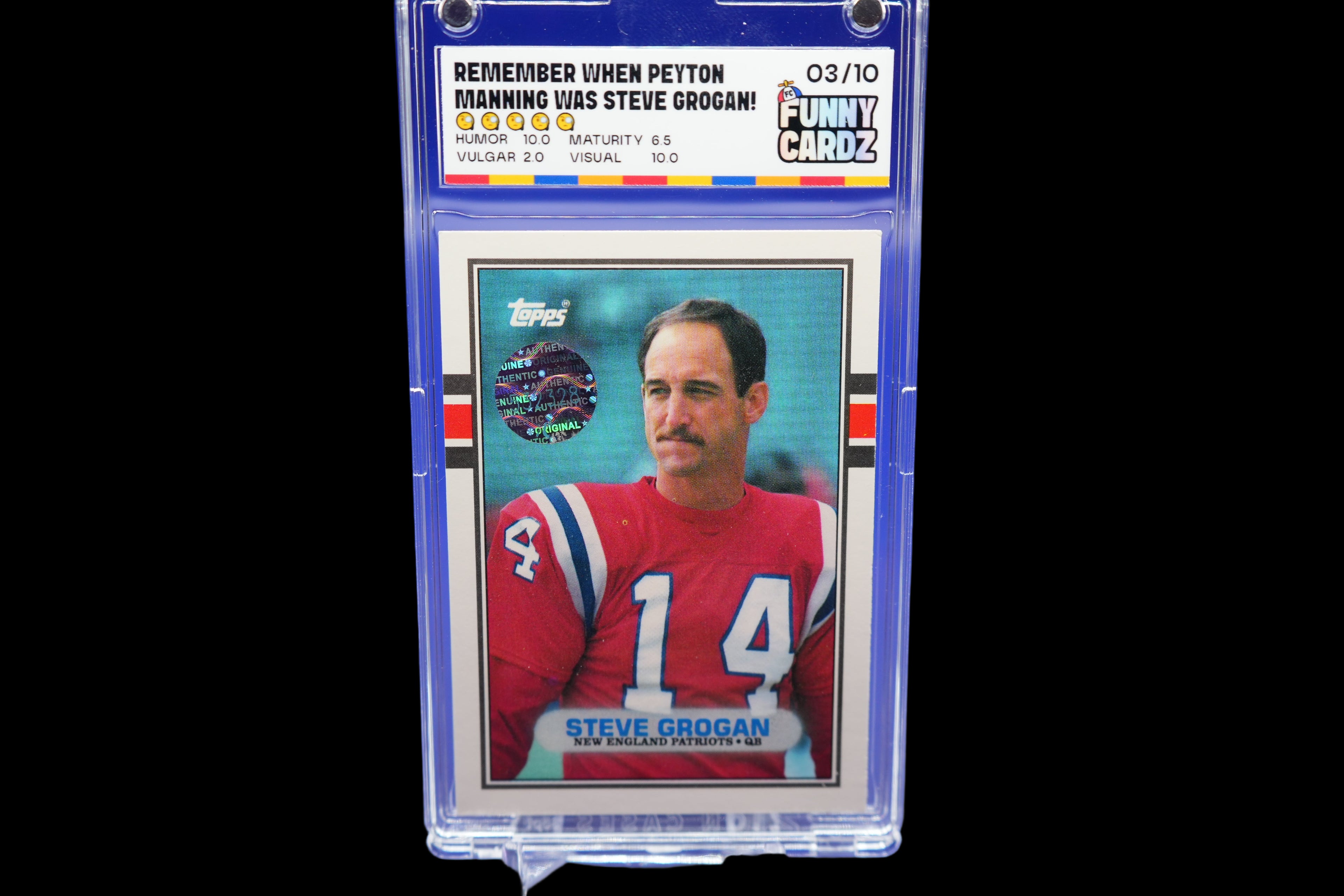 Trading card of Steve Grogan in a display case with a blue background