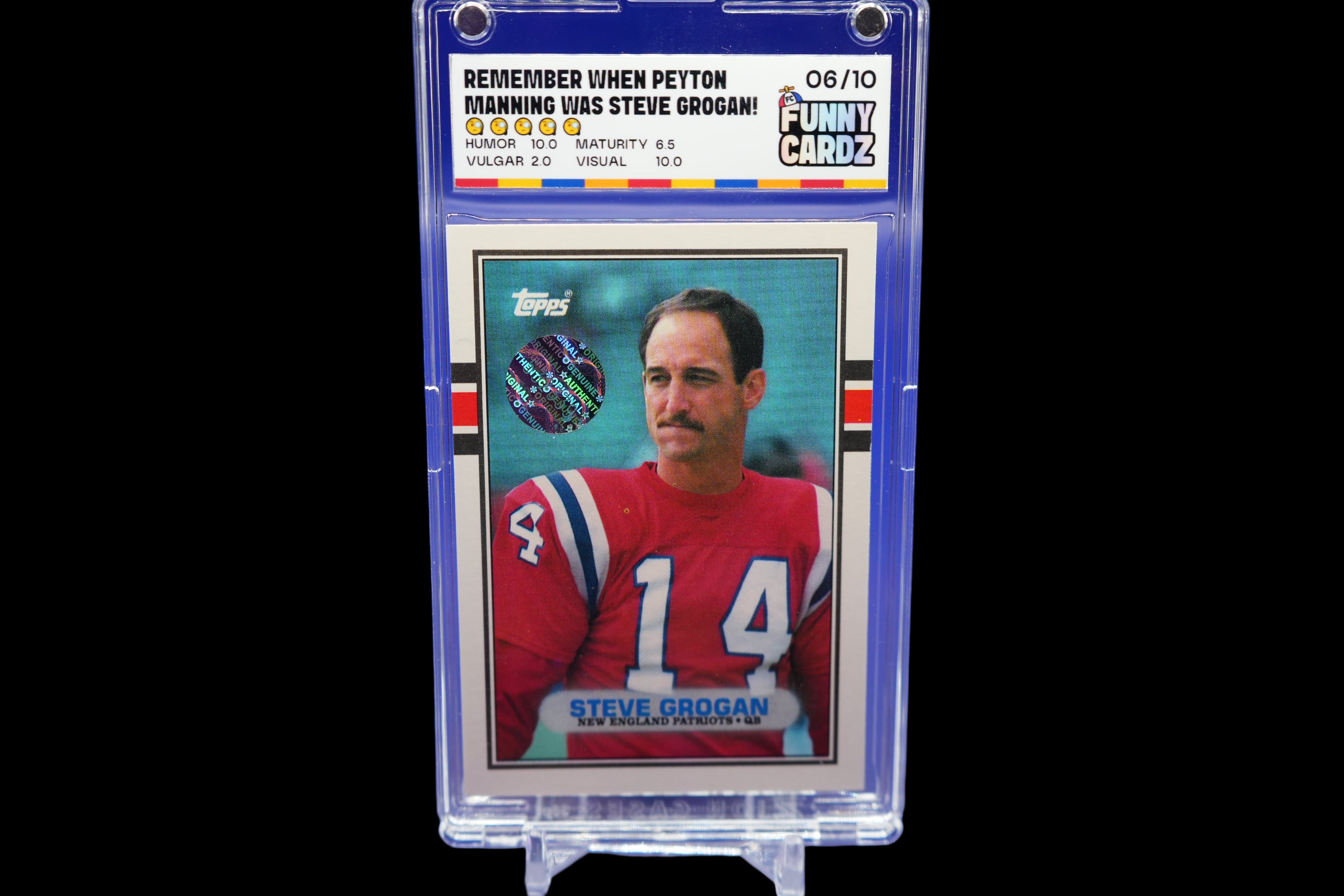 Trading card of Steve Grogan in a protective case on a blue background