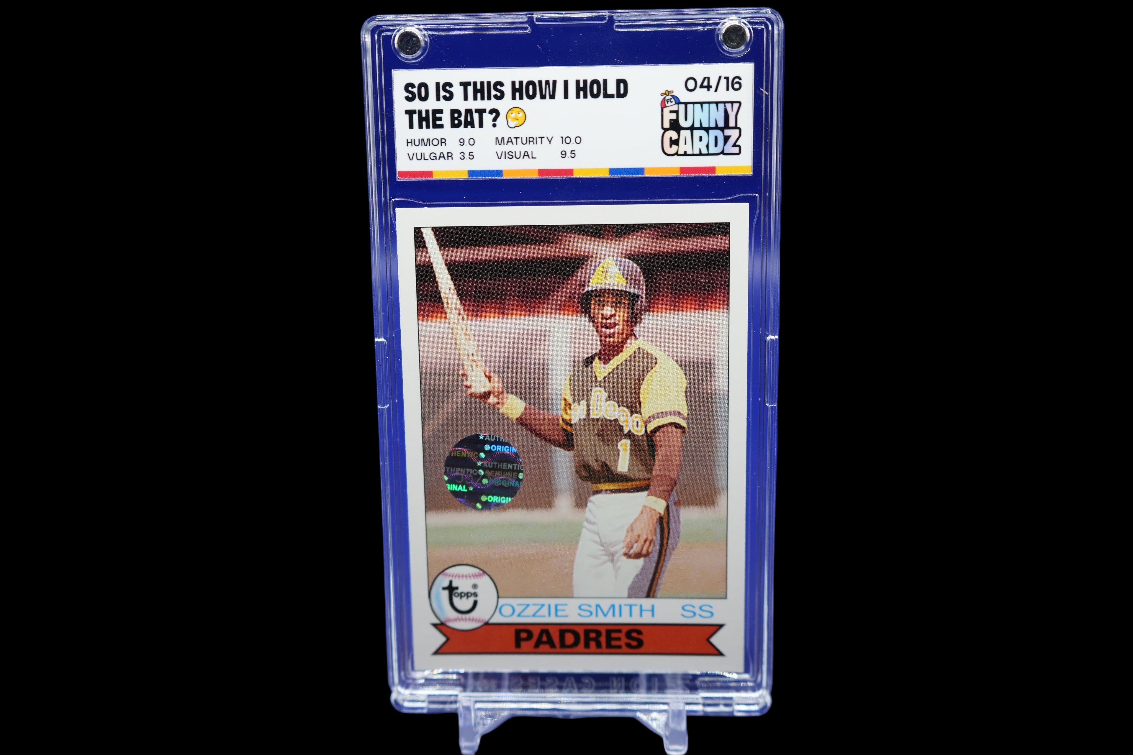Baseball trading card of Ozzie Smith in a display case on a blue background