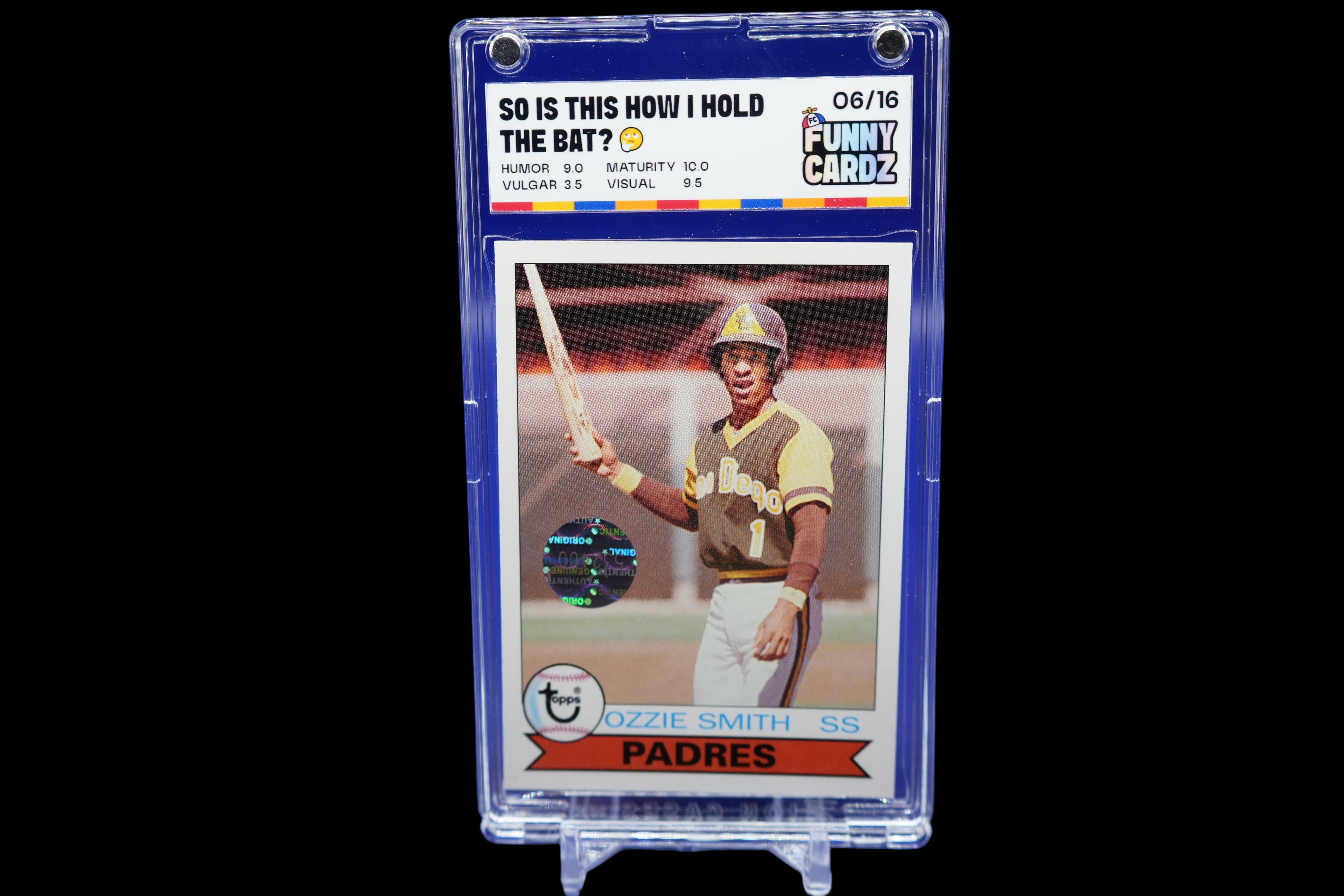 Baseball trading card of a player in a display case with a blue background