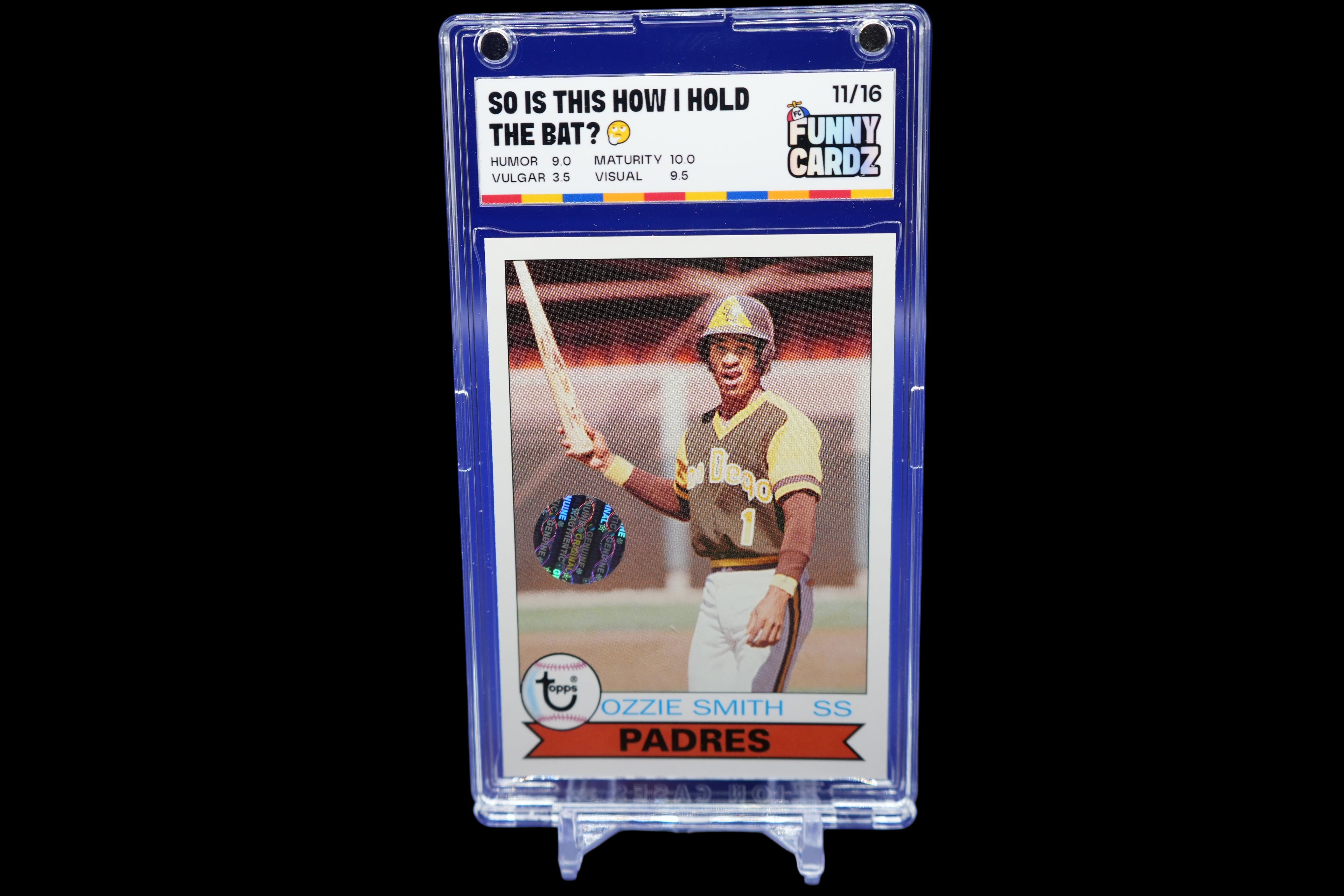 Baseball trading card of Ozzie Smith in a display case on a blue background