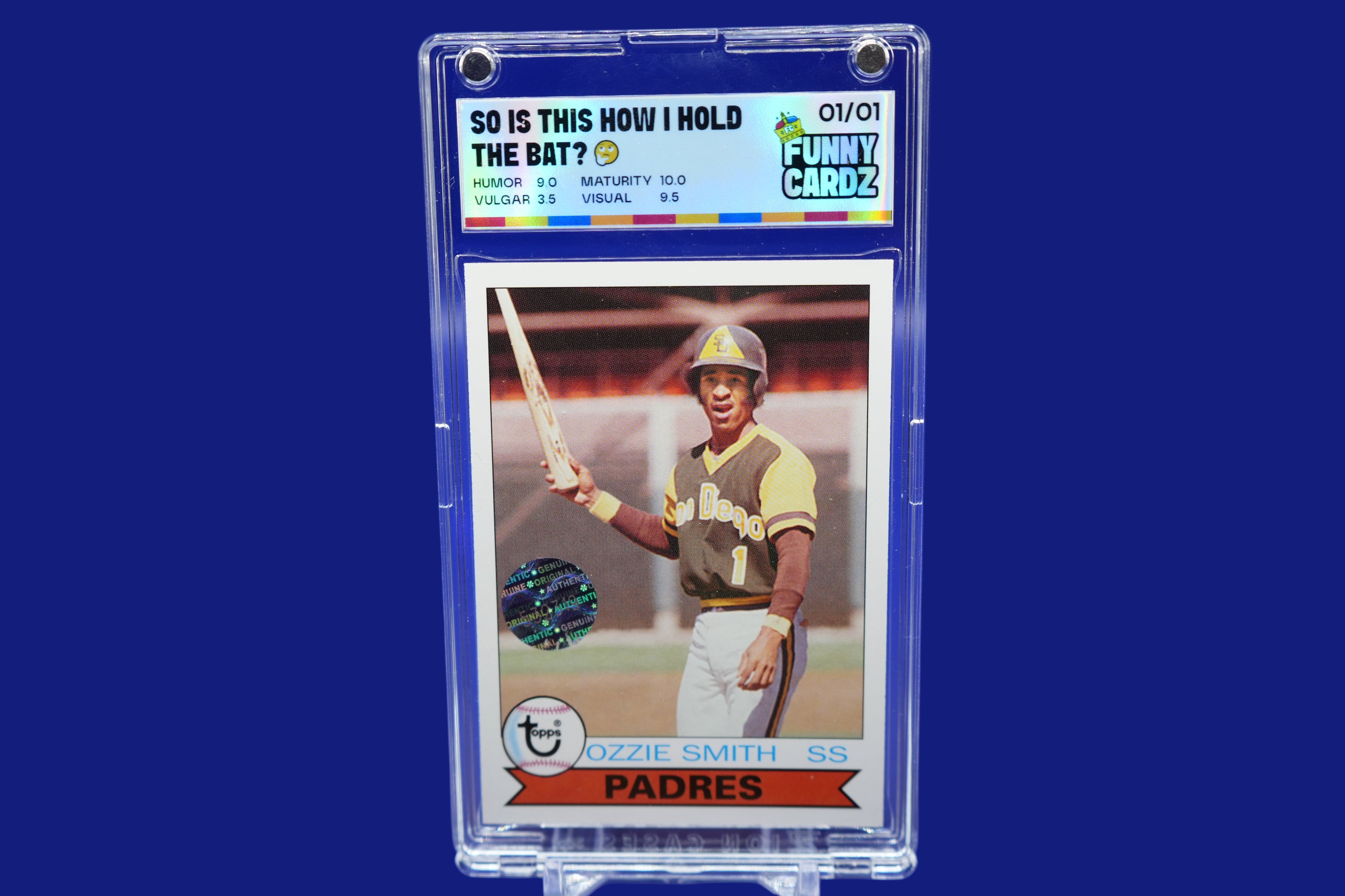 Trading card of a baseball player in a display case with a blue background