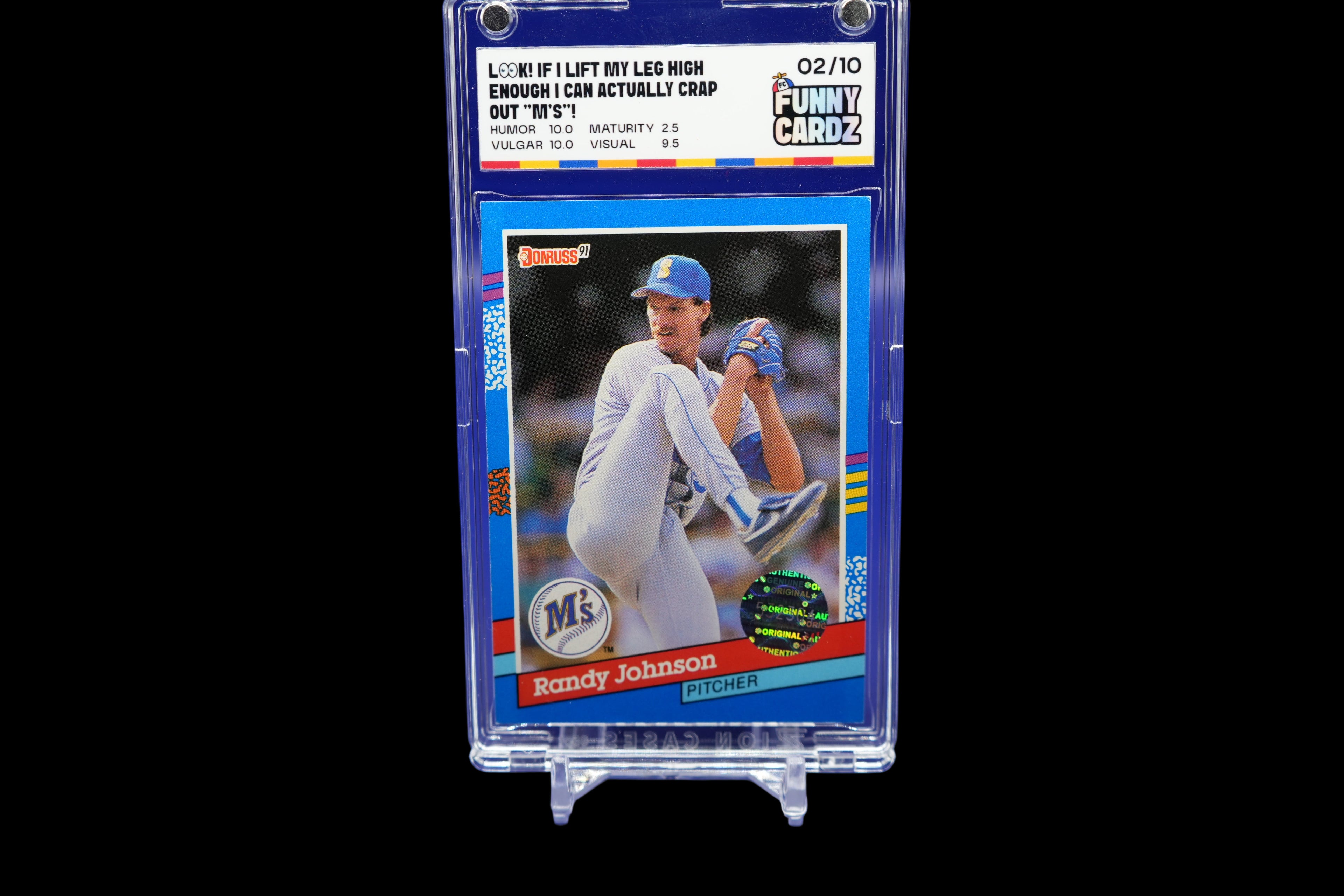 Baseball trading card of Randy Johnson in a protective display case on a blue background