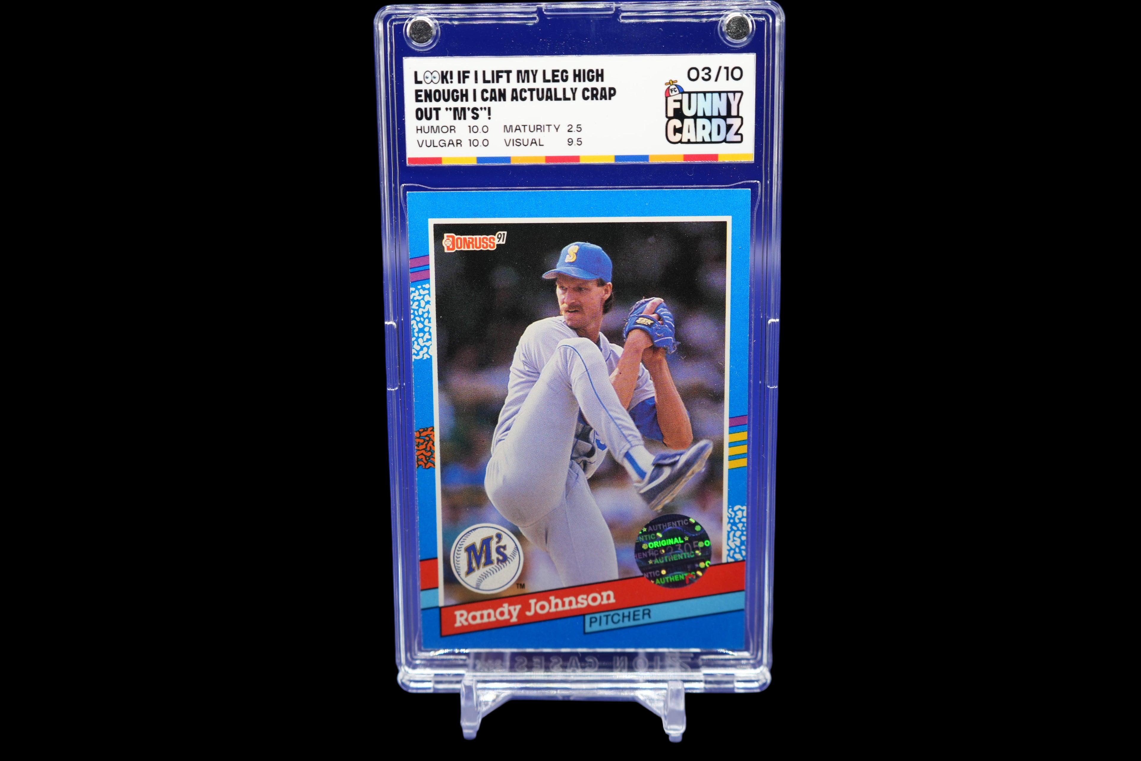 Baseball trading card of Randy Johnson in a display case on a blue background