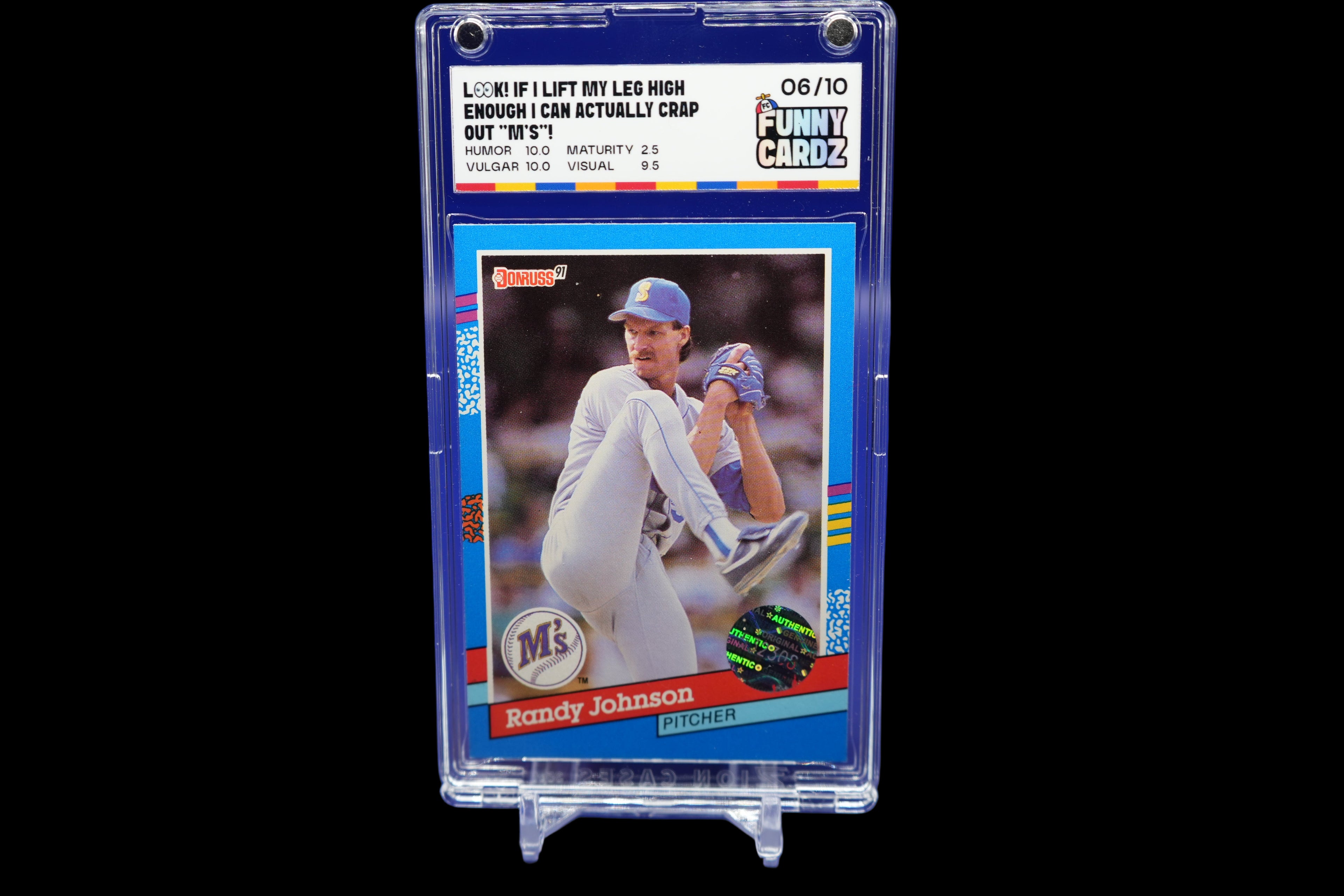 Baseball trading card of Randy Johnson in a display case on a blue background