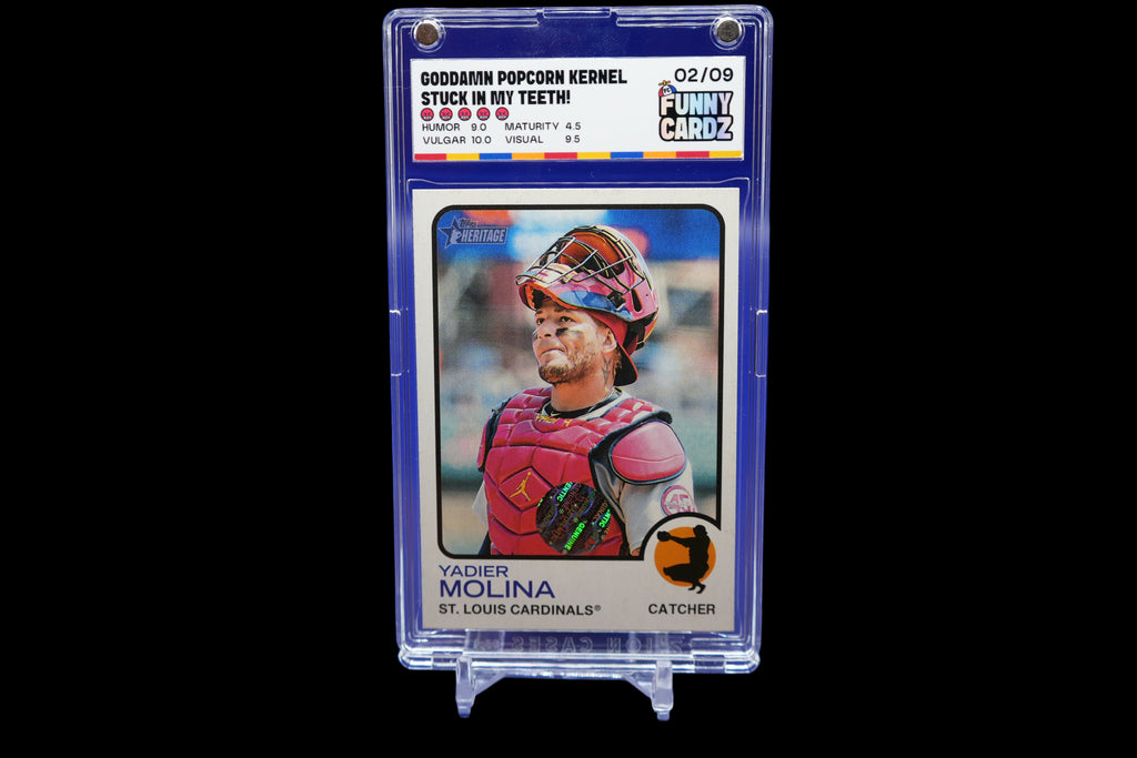 Trading card of a baseball player in a protective case on a blue background